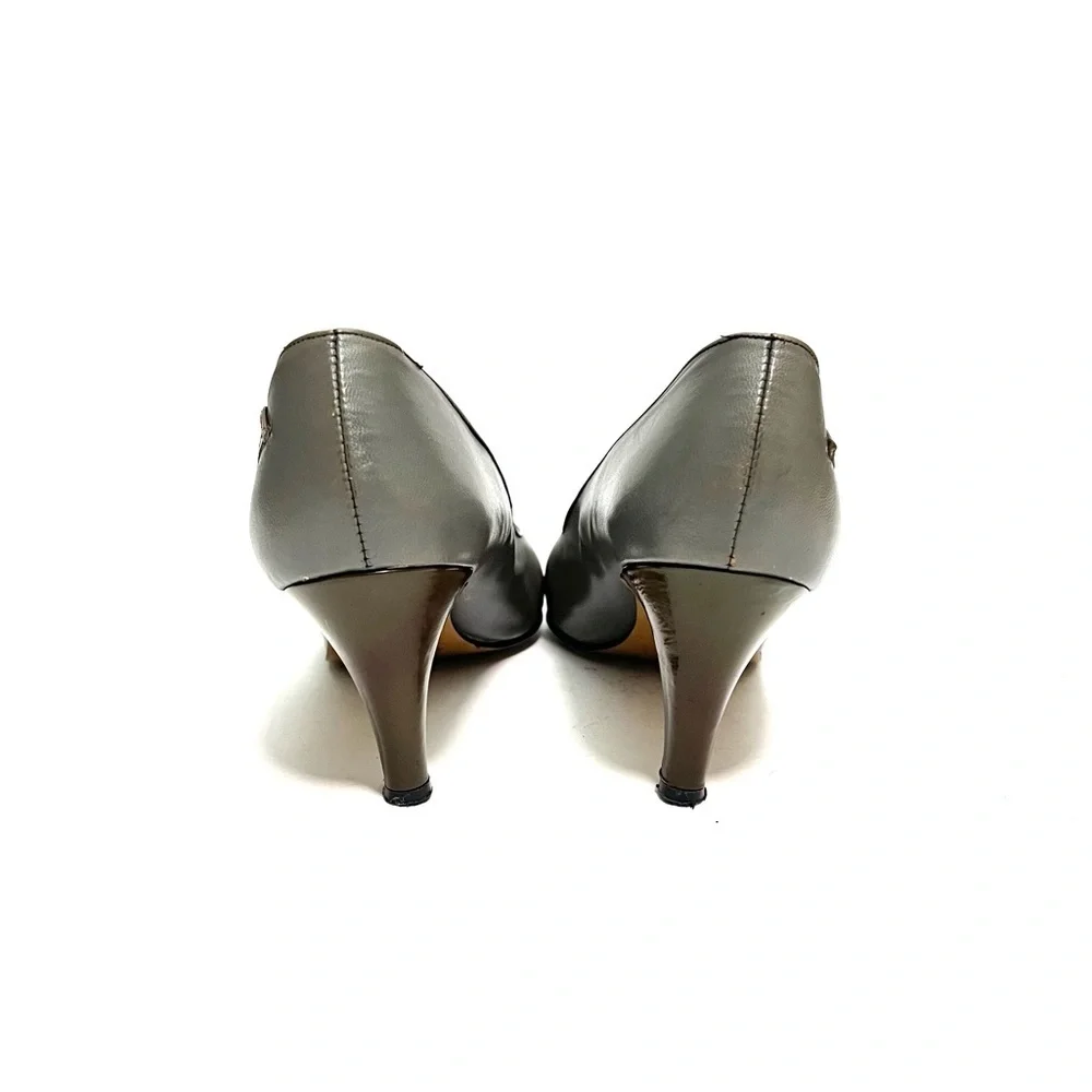 Vintage 1970s olive green patent leather asymmetrical appliqué pumps